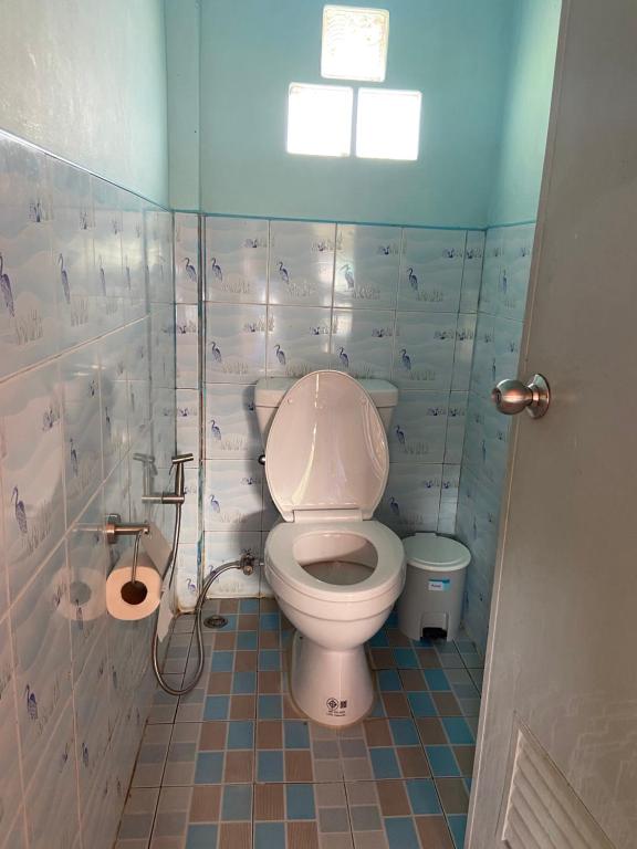 Koupelna v ubytování Patcharin Homestay