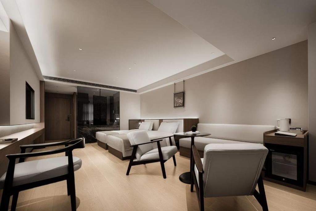 Posezení v ubytování Walling Hotel - Chongqing hongyadong jialingjiang binjianglu