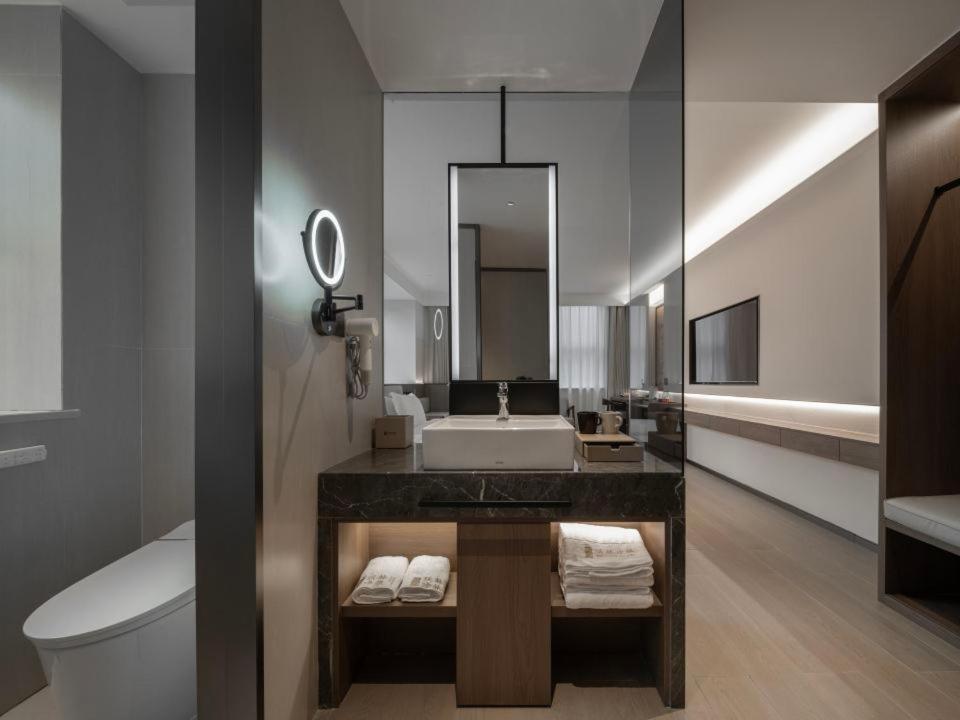 Koupelna v ubytování Walling Hotel - Chongqing hongyadong jialingjiang binjianglu