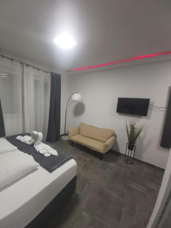 Postel nebo postele na pokoji v ubytování Panda Rooms