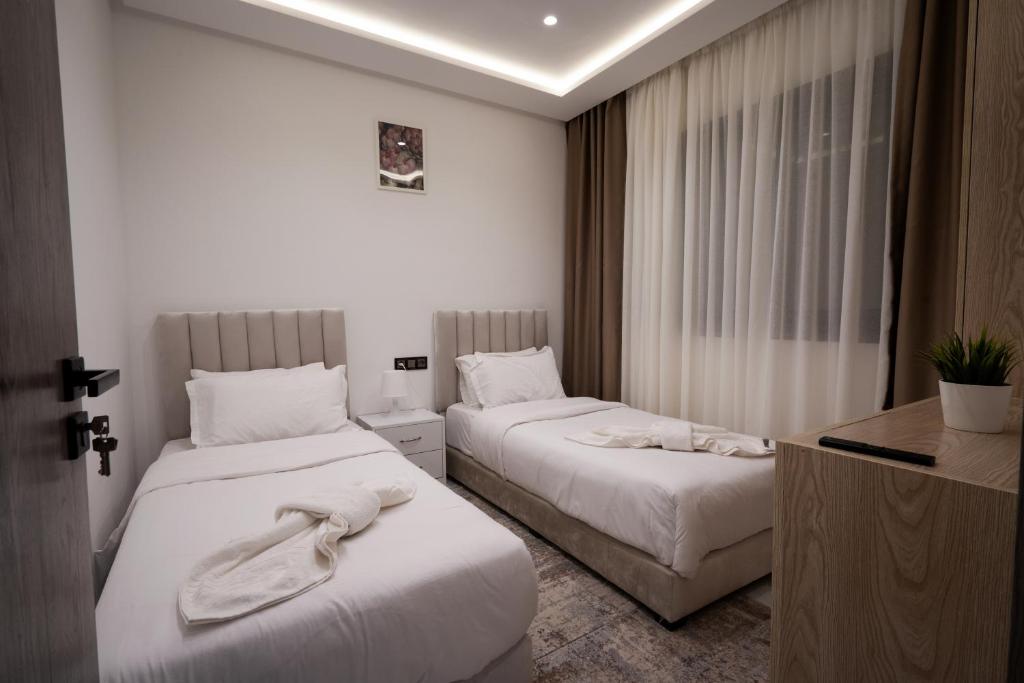 Postel nebo postele na pokoji v ubytování Living Appart-Hotel