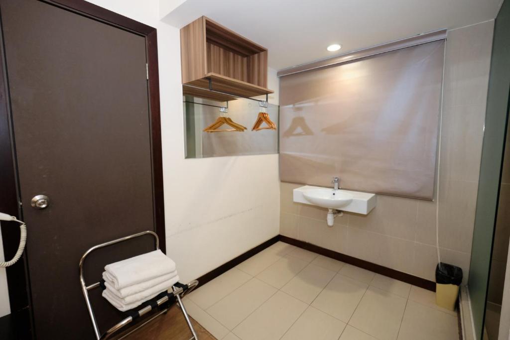 Koupelna v ubytování Memoire Hornbill Hotel Kuching Sarawak