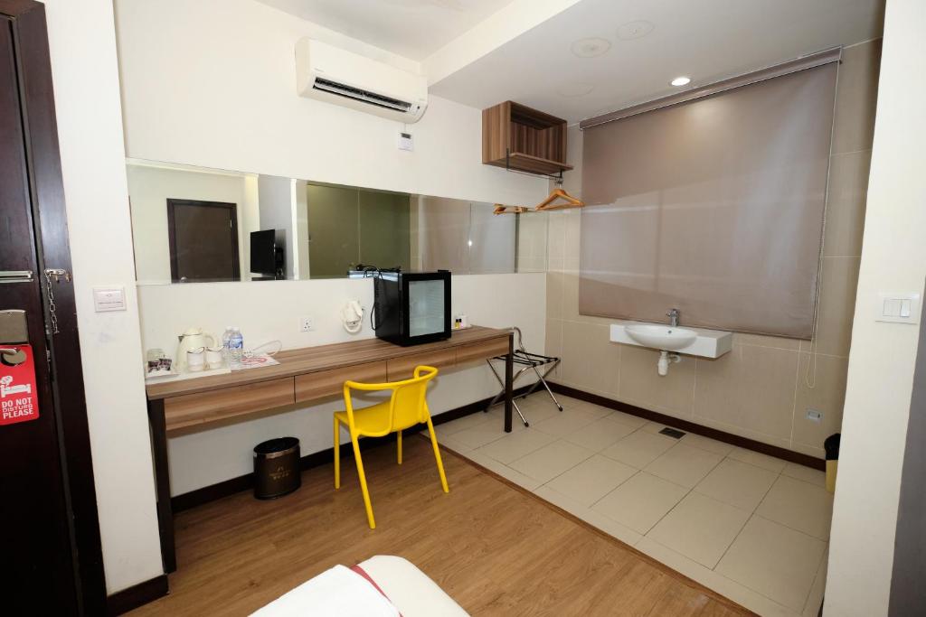 Kuchyň nebo kuchyňský kout v ubytování Memoire Hornbill Hotel Kuching Sarawak
