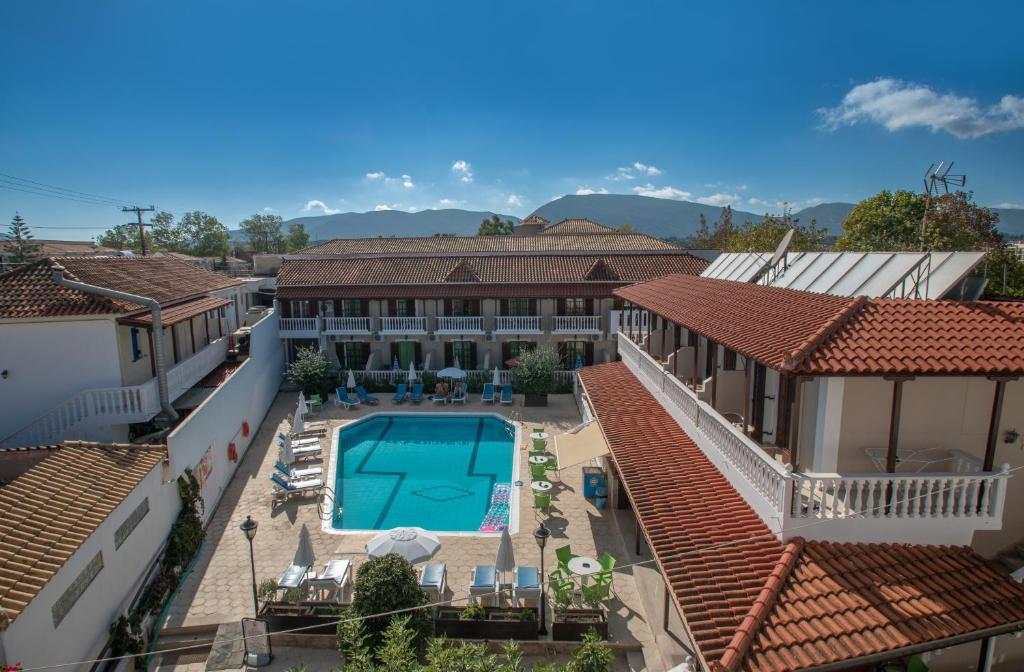 an aerial view of a house with a swimming pool at Anadiomeni Pool & Beach Apartments by "elite" in Zakynthos