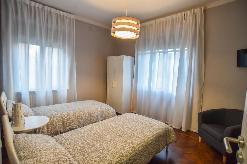 Letto o letti in una camera di L'Agrifoglio Affittacamere