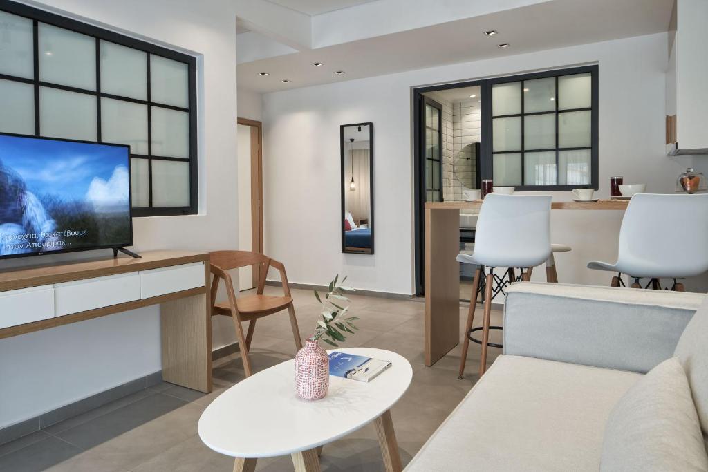 TV a/nebo společenská místnost v ubytování Cozy Suites Potos