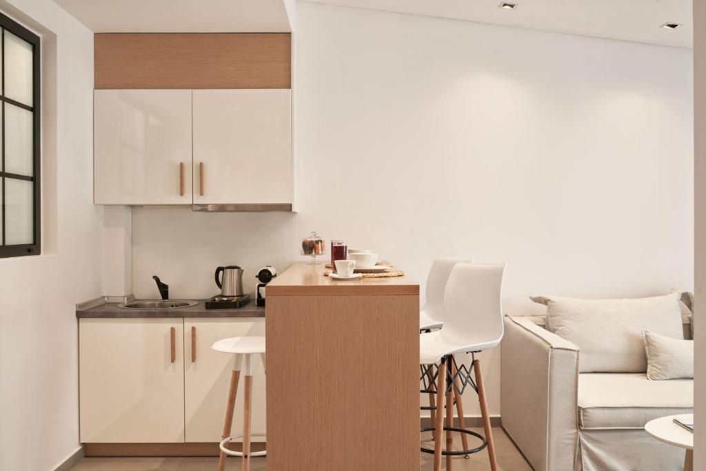 Kuchyň nebo kuchyňský kout v ubytování Cozy Suites Potos