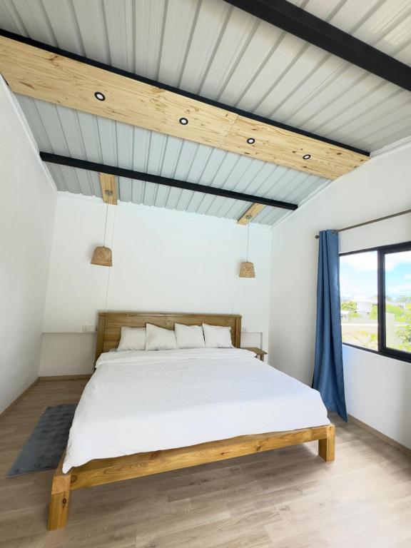 Postel nebo postele na pokoji v ubytování Palmiste Villa