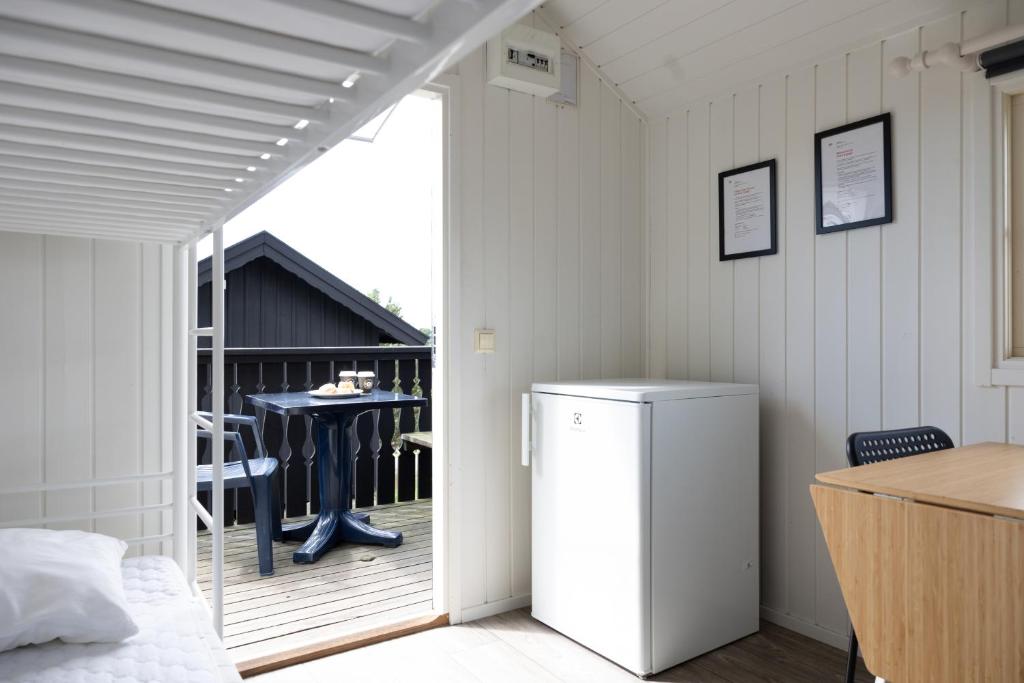 Postel nebo postele na pokoji v ubytování First Camp City-Strömstad
