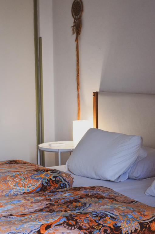 Postel nebo postele na pokoji v ubytování Lima Sol House