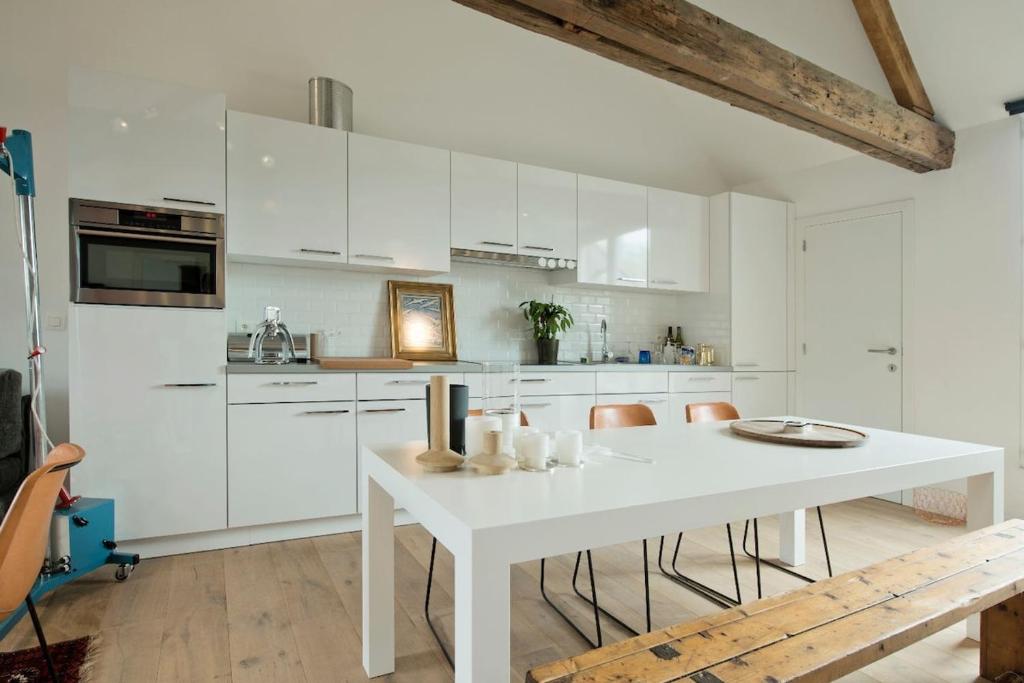 Kuchyň nebo kuchyňský kout v ubytování Tempor'area Apartment