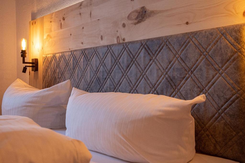 Postel nebo postele na pokoji v ubytování ZugspitzApps,Villa SONNENSCHEIN