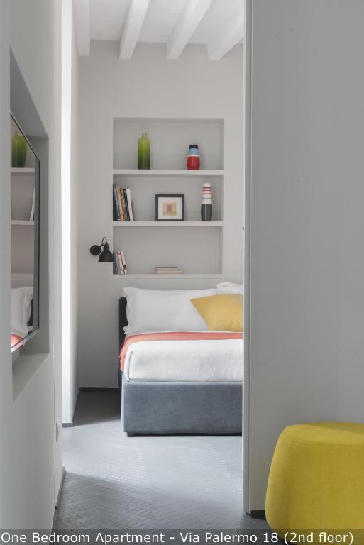 Łóżko lub łóżka w pokoju w obiekcie Brera Apartments