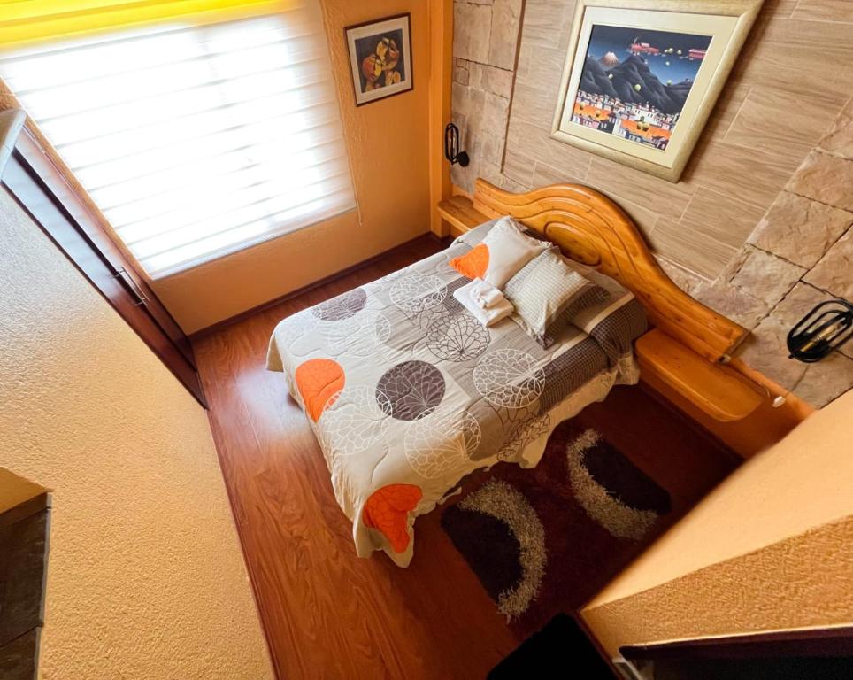 Postel nebo postele na pokoji v ubytování Hotel Rodelu