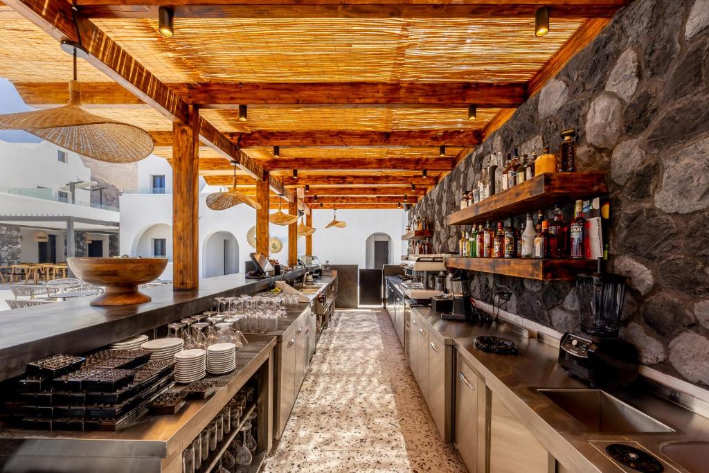 Kuchyň nebo kuchyňský kout v ubytování Santo Mangata Boutique Hotel