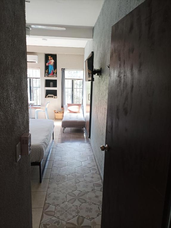 Voodi või voodid majutusasutuse Habitaciones Dos Antonios toas