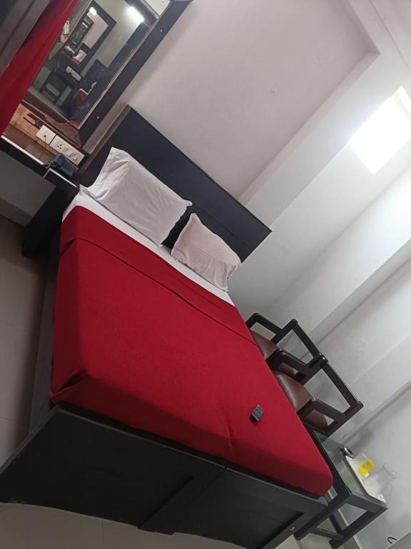 Postel nebo postele na pokoji v ubytování sun city
