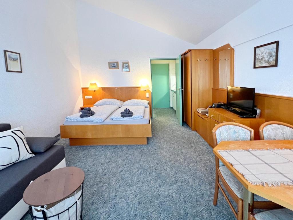Postel nebo postele na pokoji v ubytování Apartman Mitterdorf