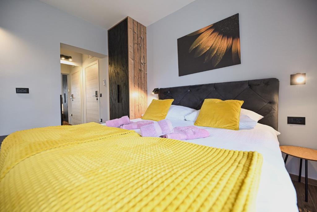 Postel nebo postele na pokoji v ubytování Solemar Luxury Rooms Free Parking