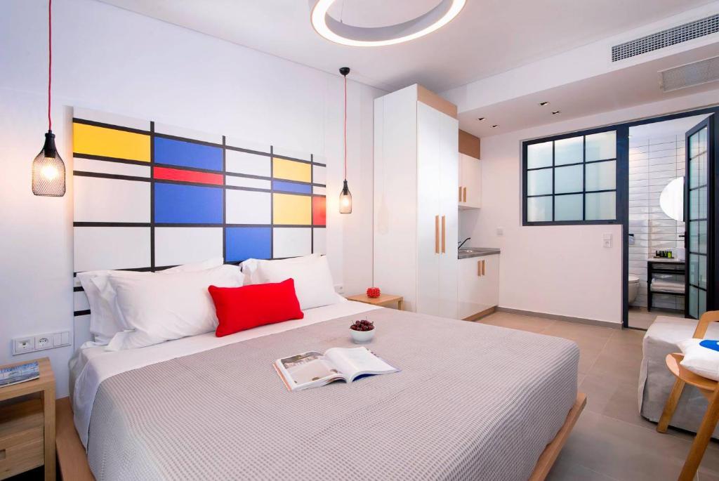 Postel nebo postele na pokoji v ubytování Cozy Suites Potos