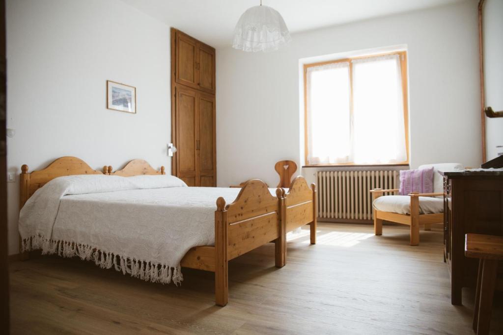 Posteľ alebo postele v izbe v ubytovaní Agritur Rizzi di Inama Ugo