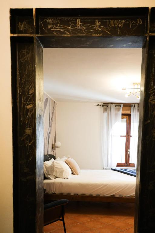 Postel nebo postele na pokoji v ubytování Clos du Pinot by Hili