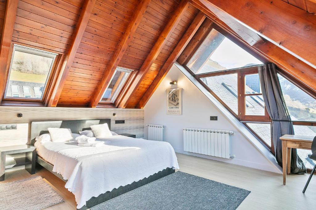 Postel nebo postele na pokoji v ubytování Luderna - Dúplex con terraza Laveja