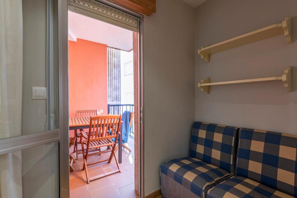 Posezení v ubytování Apartamento turístico 3 habitaciones a 140m playa Caneliñas Portonovo 101