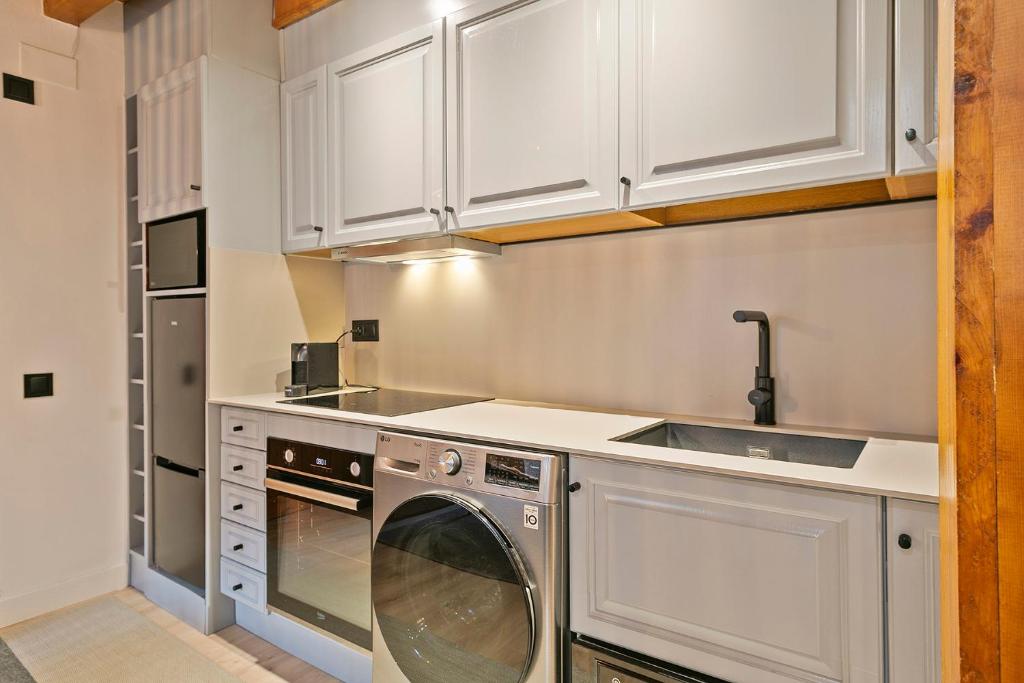 Kuchyň nebo kuchyňský kout v ubytování Luderna - Apartamento con jardín Pleta de Arties Montardo