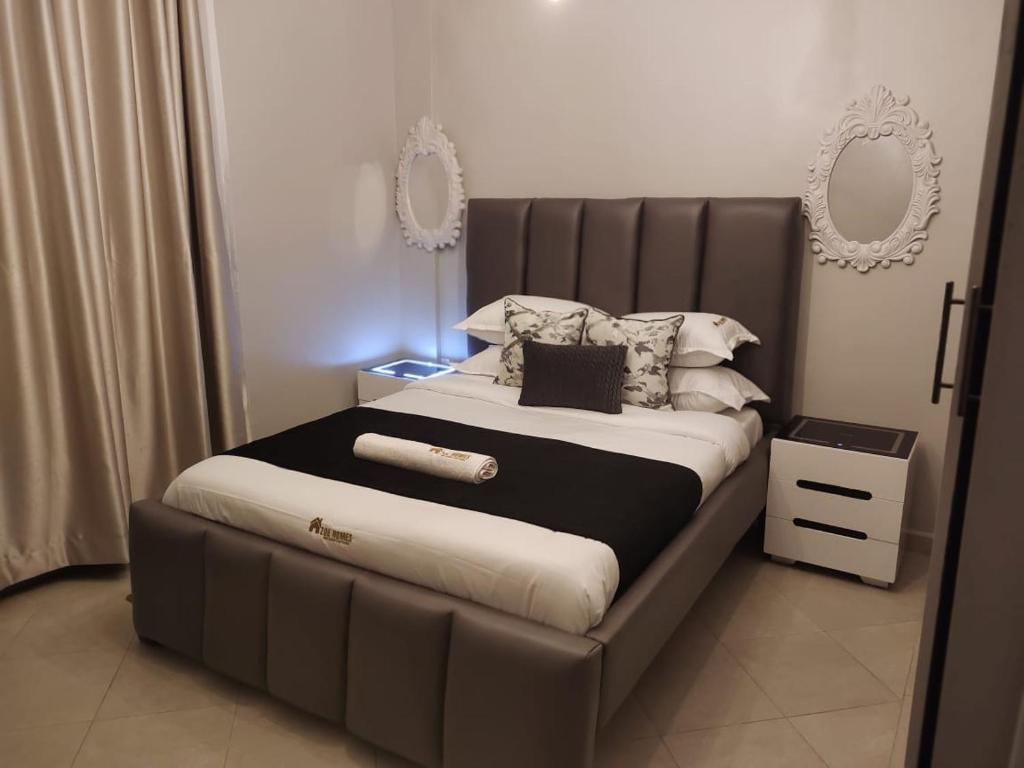 Giường trong phòng chung tại Zoe Homes 1 bedroom Apartment NAIVASHA REHEMA HOMES -F207
