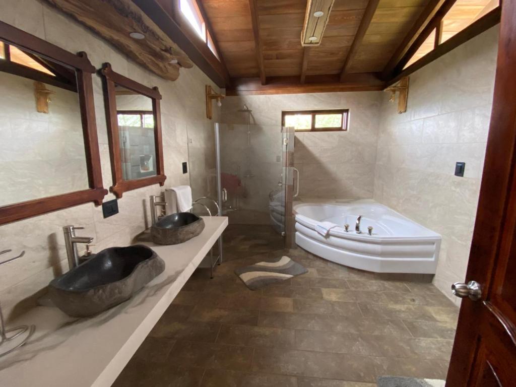 Postel nebo postele na pokoji v ubytování Hosteria Cananvalle