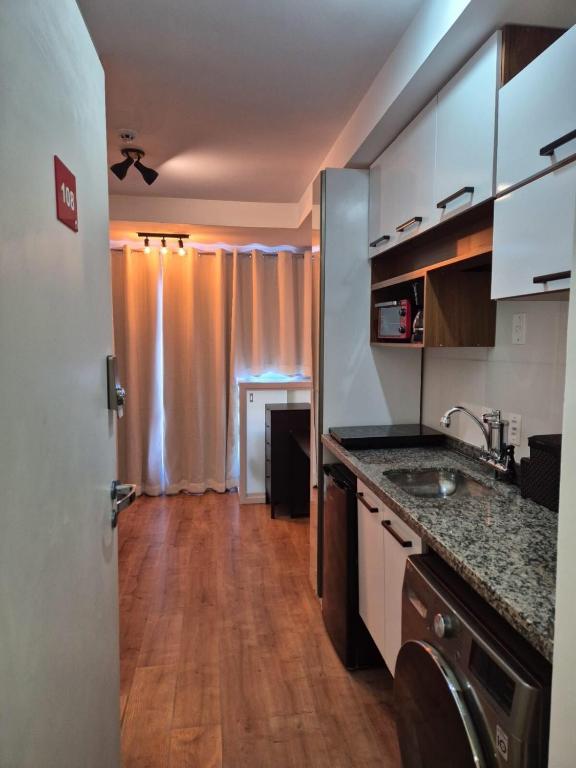 Kuchyň nebo kuchyňský kout v ubytování Estúdio Itaquera, Neo Química Arena, GRU Aeroporto Guarulhos