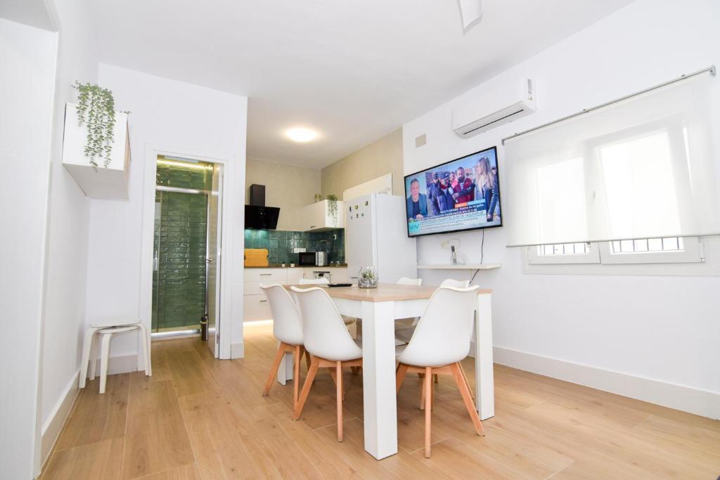 TV a/nebo společenská místnost v ubytování Apartamentos Atlantida