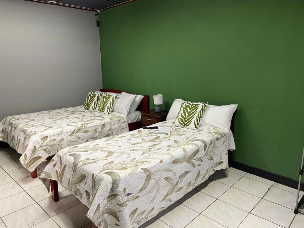 Postel nebo postele na pokoji v ubytování la casona rio