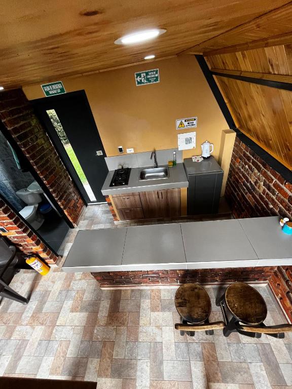 Kuchyň nebo kuchyňský kout v ubytování Cabañas Aiyana