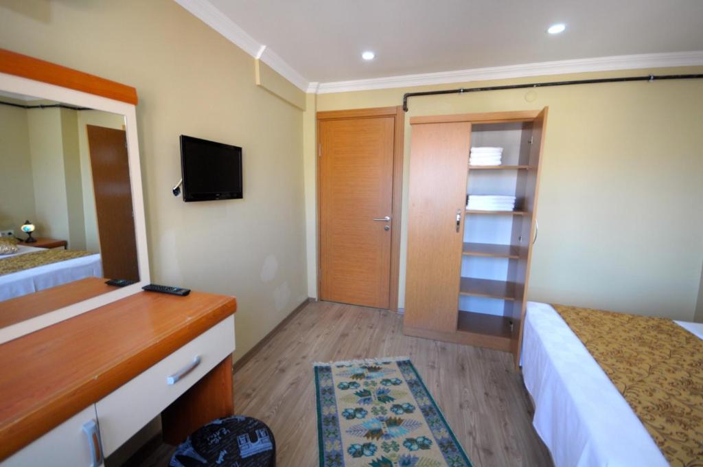 Postel nebo postele na pokoji v ubytování Marida Residence - Istanbul Taksim