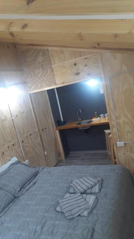 Postel nebo postele na pokoji v ubytování Dos Charitos