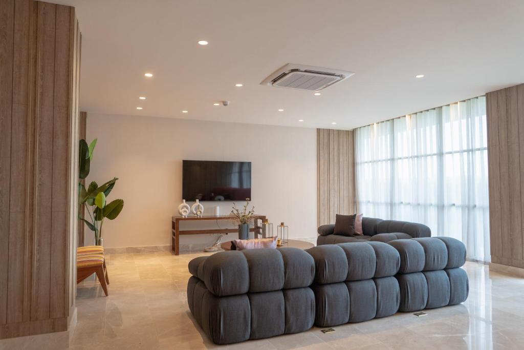 TV a/nebo společenská místnost v ubytování Loft con salida al mar en Cartagena