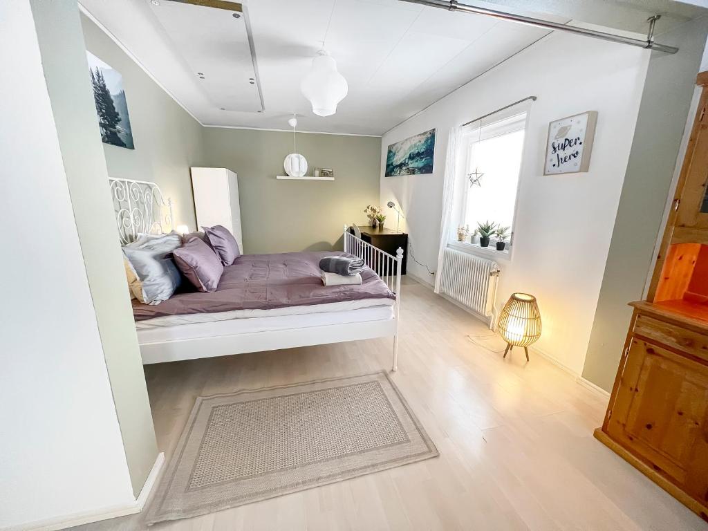 Ένα ή περισσότερα κρεβάτια σε δωμάτιο στο The Clinic apartment