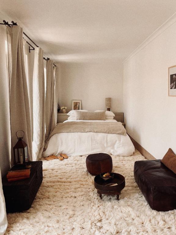 Postel nebo postele na pokoji v ubytování Riad Berbère Marrakech