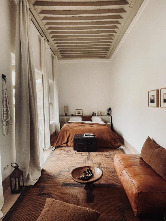 Postel nebo postele na pokoji v ubytování Riad Berbère Marrakech