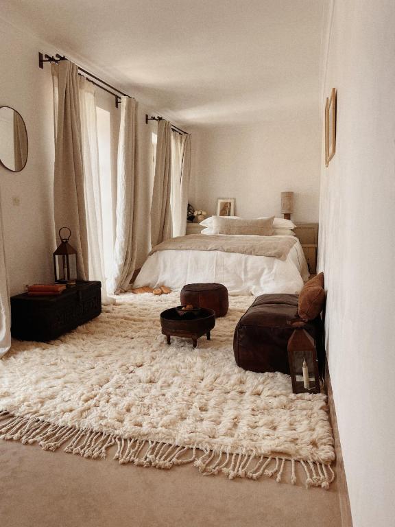 Postel nebo postele na pokoji v ubytování Riad Berbère Marrakech