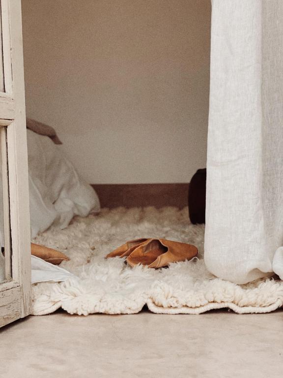 Postel nebo postele na pokoji v ubytování Riad Berbère Marrakech