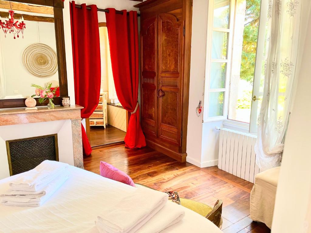 Postel nebo postele na pokoji v ubytování Le Relais des Anges