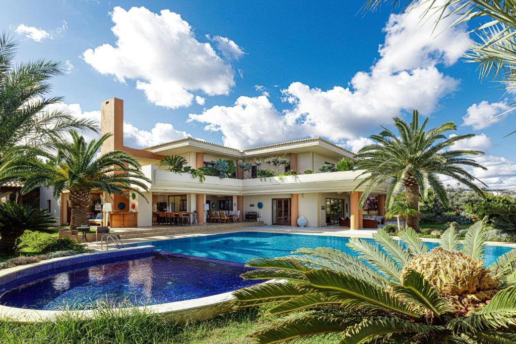 Bazén v ubytování Palm Hill Villa nebo v jeho okolí