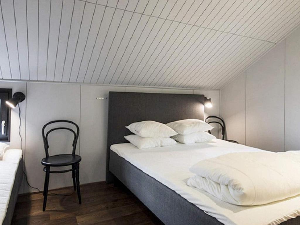 Кровать или кровати в номере Holiday home SÄLEN II