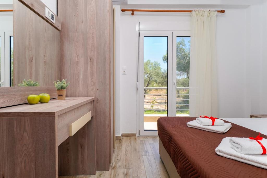 Postel nebo postele na pokoji v ubytování Olive Garden