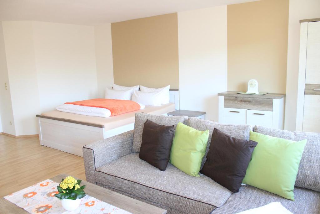 Postel nebo postele na pokoji v ubytování APARTHOTEL 1A