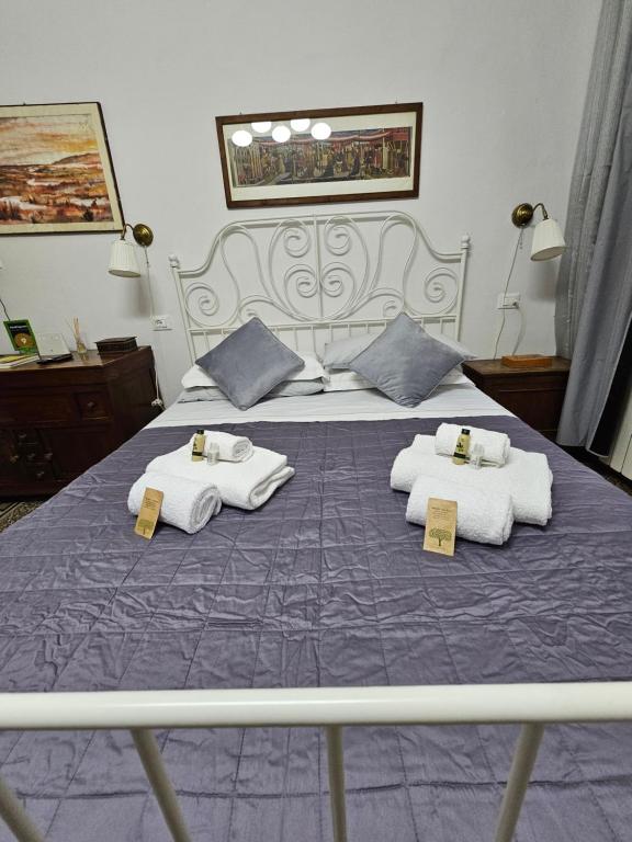 Posteľ alebo postele v izbe v ubytovaní Florence Signoria Apartment