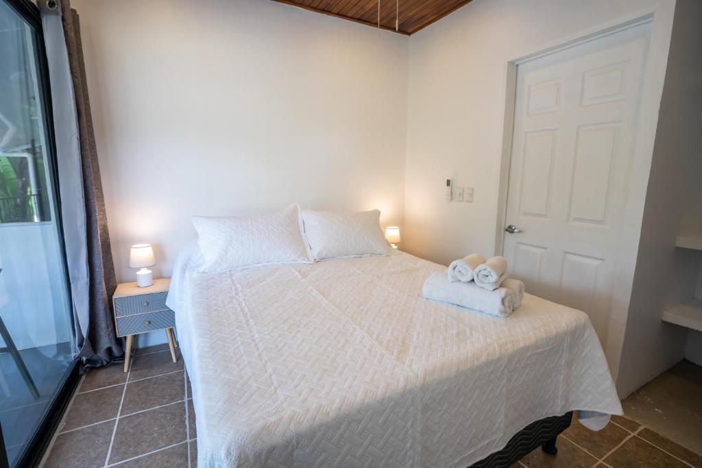 Postel nebo postele na pokoji v ubytování Mango Coliving Rooms for Digital Nomads